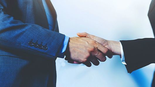 two people shaking hands